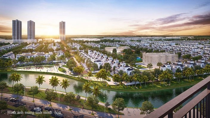 Toàn cảnh khu đô thị với sông, biệt thự và chung cư cao tầng lúc hoàng hôn