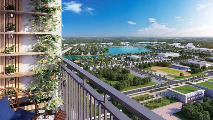 Góc nhìn từ ban công căn hộ ra toàn cảnh khu đô thị với hồ nước và cây xanh