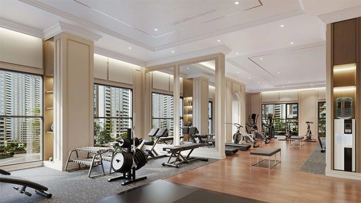 Phòng tập gym hiện đại với đầy đủ trang thiết bị cao cấp và cửa sổ lớn nhìn ra cảnh quan đô thị