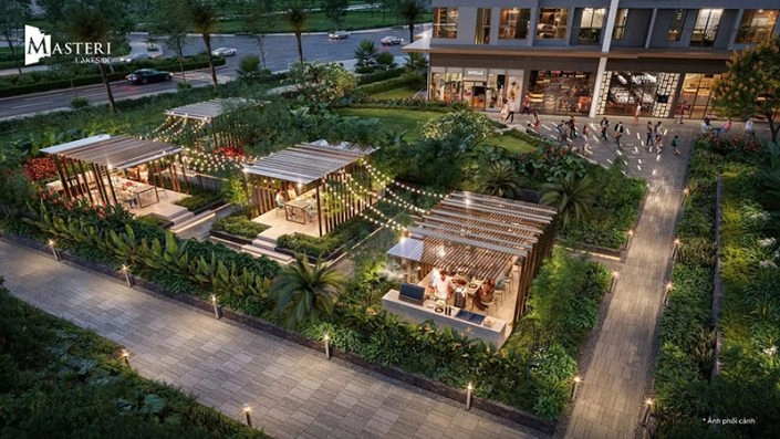 Khu vực BBQ và ẩm thực ngoài trời với đèn trang trí lung linh, tạo không gian ấm cúng cho cư dân Masteri Lakeside